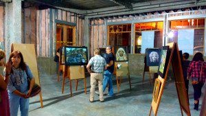 Patrons viewing local art
